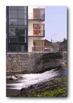 The weir on the River Slaney, with apartments on the site of the old mill